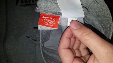 how to tell if a nike product is fake|nike jersey authentic code check.